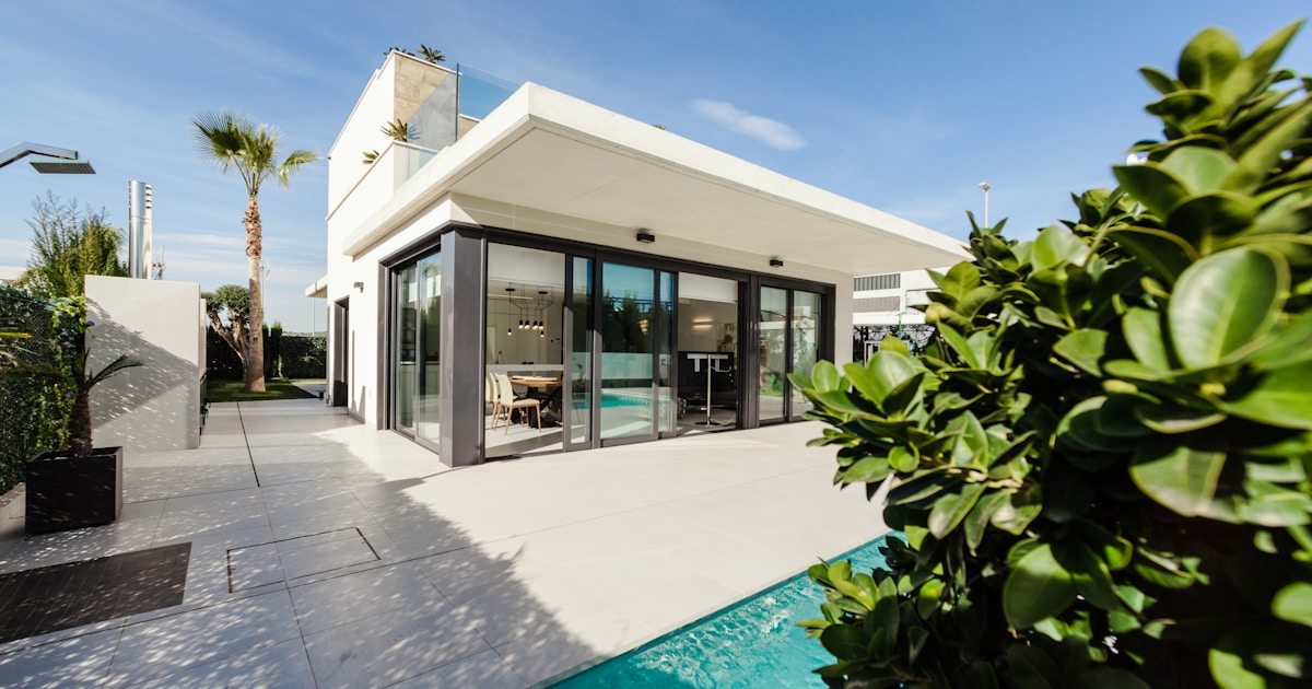 Modern house exterior with fencing and landscaping