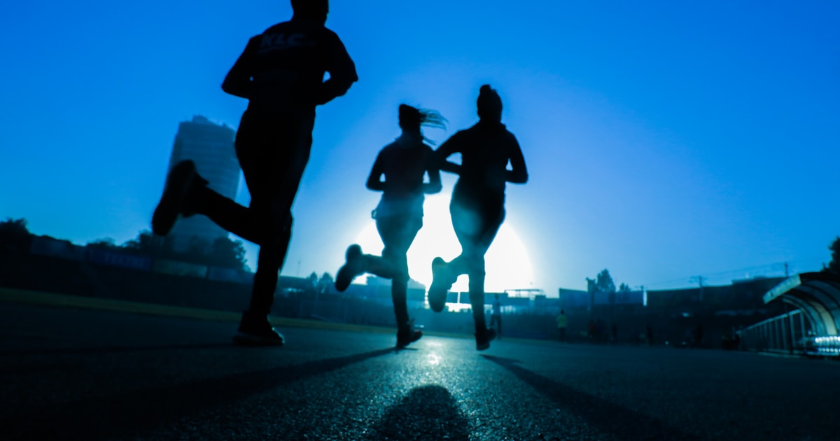 Beginner runners training outdoors