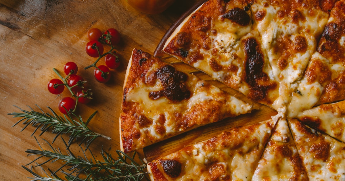 Fresh pizzas on a table ready for a party