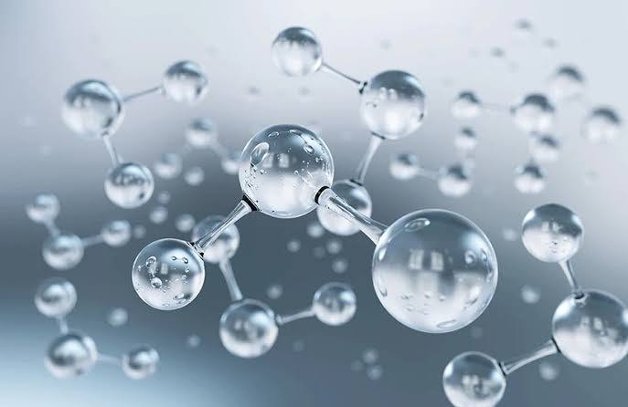 Peptide dosage calculator on screen with pen and vial math